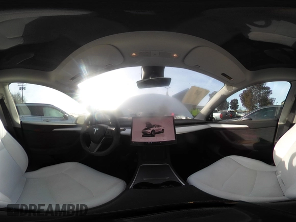 2023 Tesla Model Y Long Range z VIN 7SAYGDEE9PF623285, wystawiony jako IAAI lot #41383184 z przebiegiem 34 092 mil mil oraz . Historia ofert i sprzedaży dostępna na DreamBid. Obrazek 20.
