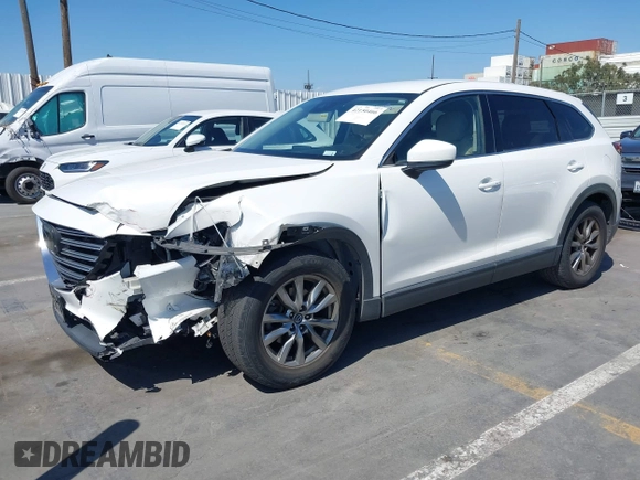 2019 Mazda CX-9 Touring with VIN JM3TCACY5K0306424, listed as a IAAI auction lot 42150466 with 95,166 mi miles and . Bid and sale history available at DreamBid. Image 2.