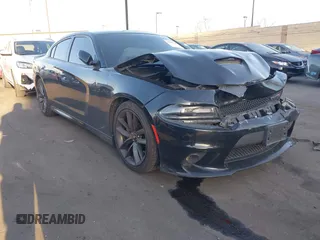 2019 Dodge Charger GT with VIN 2C3CDXHGXKH597477, listed as a IAAI auction lot 41840022 with 81,671 mi miles and . Bid and sale history available at DreamBid. Image 1.