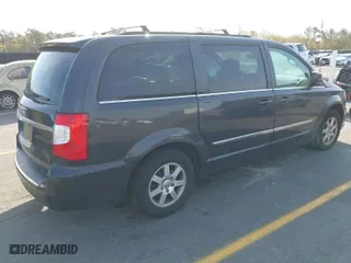 2012 Chrysler Town & Country Touring with VIN 2C4RC1BG1CR203827, listed as a IAAI auction lot 41900316 with 160,131 mi miles. Bid and sale history available at carsss.com. Image 4.