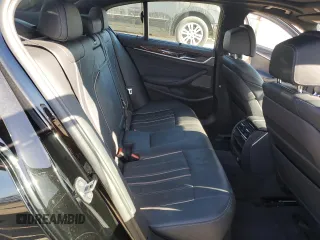 2019 BMW 5 Series M550i xDrive with VIN WBAJB9C50KB464503, listed as a Copart auction lot 56995825 with 67,324 mi miles and Salvage title. Bid and sale history available at DreamBid. Image 10.