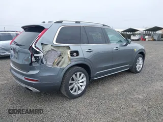 2016 Volvo XC90 T6 Momentum z VIN YV4A22PK7G1033452, wystawiony jako IAAI lot #41884004 z przebiegiem 78 734 mil mil oraz . Historia ofert i sprzedaży dostępna na DreamBid. Obrazek 4.
