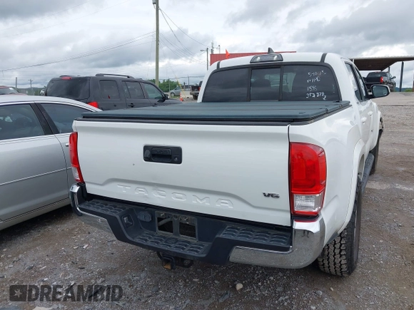 2017 Toyota Tacoma SR5 z VIN 3TMAZ5CN8HM051558, wystawiony jako IAAI lot #42320319 z przebiegiem 101 767 mil mil oraz . Historia ofert i sprzedaży dostępna na DreamBid. Obrazek 16.