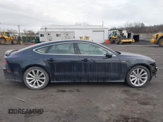 2014 Audi A7 3.0 Prestige with VIN WAU2GAFC5EN071911, listed as a IAAI auction lot 41453159 with 120,569 mi miles. Bid and sale history available at carsss.com. Image 13.