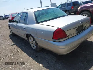 2008 Ford Crown Victoria LX z VIN 2FAFP74V78X175272, wystawiony jako IAAI lot #41998694 z przebiegiem Nie podano mil oraz . Historia ofert i sprzedaży dostępna na DreamBid. Obrazek 3.