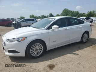 2013 Ford Fusion SE Hybrid z VIN 3FA6P0LU7DR245720, wystawiony jako Copart lot #60231425 z przebiegiem 249 180 mil mil oraz Czysty tytuł • Clean title. Historia ofert i sprzedaży dostępna na DreamBid. Obrazek 1.