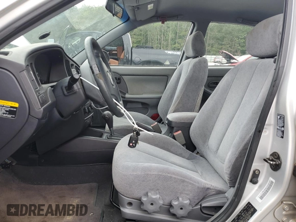 2004 Hyundai Elantra GLS z VIN KMHDN46D34U859307, wystawiony jako Copart lot #53847235 z przebiegiem 91 939 mil mil oraz Szkoda całkowita • Salvage title. Historia ofert i sprzedaży dostępna na DreamBid. Obrazek 7.