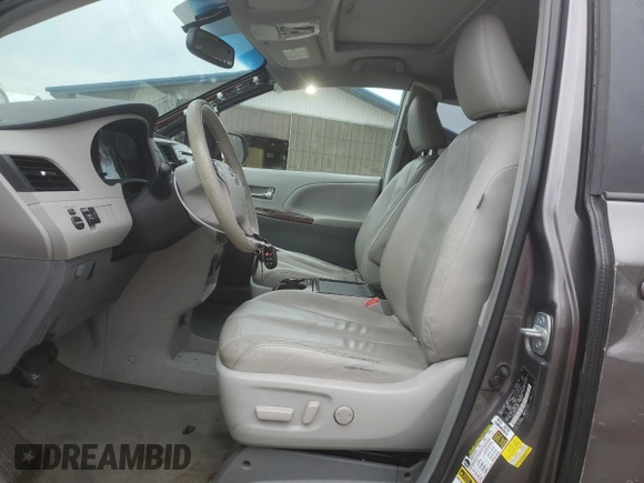 2014 Toyota Sienna XLE with VIN 5TDYK3DC1ES492724, listed as a Copart auction lot 51605245 with 112,079 mi miles and Salvage Title. Bid and sale history available at carsss.com. Image 7.