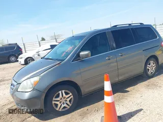 2007 Honda Odyssey EX-L with VIN 5FNRL38767B452922, listed as a IAAI auction lot 41917482 with 282,542 mi miles and . Bid and sale history available at DreamBid. Image 2.
