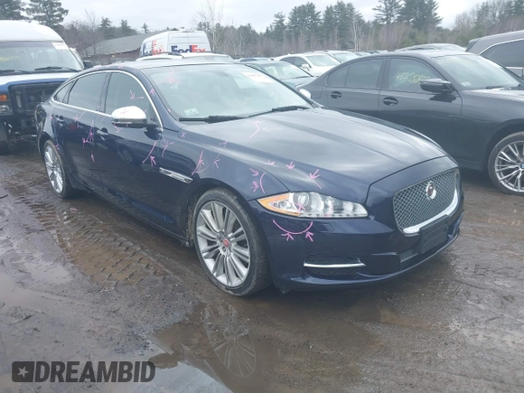2015 Jaguar XJ Portfolio with VIN SAJWJ2GD0F8V83497, listed as a IAAI auction lot 41697285 with 52,311 mi miles and . Bid and sale history available at DreamBid. Image 1.