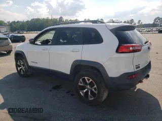 2014 Jeep Cherokee Trailhawk with VIN 1C4PJMBS5EW185510, listed as a Copart auction lot 55780005 with 130,358 mi miles and Clean title. Bid and sale history available at DreamBid. Image 2.