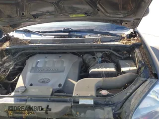2005 Hyundai Tucson GLS with VIN KM8JN12D55U142254, listed as a IAAI auction lot 42150708 with 222,286 mi miles. Bid and sale history available at carsss.com. Image 10.