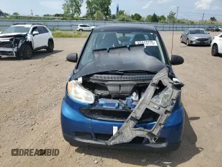 2009 Smart fortwo Pure with VIN WMEEJ31X59K218003, listed as a Copart auction lot 62413775 with 82,711 mi miles and Salvage title. Bid and sale history available at DreamBid. Image 5.
