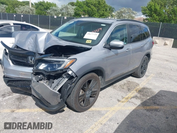 2022 Honda Pilot Special Edition with VIN 5FNYF5H21NB012512, listed as a IAAI auction lot 40677729 with 202,674 mi miles and . Bid and sale history available at carsss.com. Image 17.