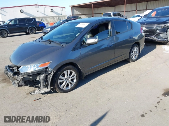2012 Honda Insight EX z VIN JHMZE2H77CS001370, wystawiony jako IAAI lot #42312077 z przebiegiem 134 249 mil mil oraz . Historia ofert i sprzedaży dostępna na DreamBid. Obrazek 18.