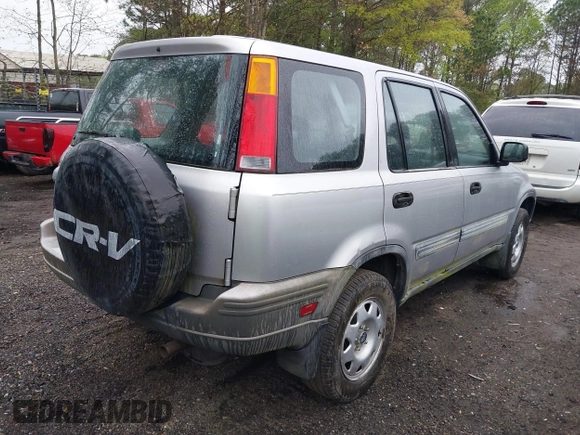 2001 Honda CR-V LX with VIN JHLRD28441C000682, listed as a IAAI auction lot 42019317 with 214,884 mi miles. Bid and sale history available at carsss.com. Image 4.