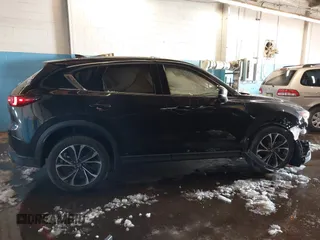 2023 Mazda CX-5 S Premium with VIN JM3KFBDM6P0100301, listed as a IAAI auction lot 41548310 with 21,722 mi miles and . Bid and sale history available at carsss.com. Image 13.
