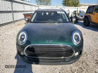 2019 MINI Clubman Cooper with VIN WMWLU1C59K2F29677, listed as a Copart auction lot 77201334 with 57,012 mi miles and Salvage Title. Bid and sale history available at carsss.com. Image 5.