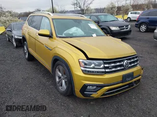 2018 Volkswagen Atlas 3.6L V6 SEL with VIN 1V2RR2CA0JC557938, listed as a IAAI auction lot 41964285 with 53,991 mi miles. Bid and sale history available at carsss.com. Image 1.