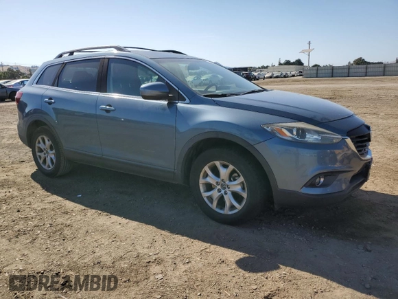 2015 Mazda CX-9 Touring with VIN JM3TB2CV1F0469009, listed as a Copart auction lot 59225785 with 93,330 mi miles and Salvage title. Bid and sale history available at DreamBid. Image 4.