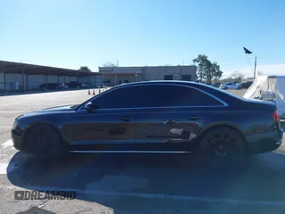 2011 Audi A8 z VIN WAURVAFD6BN019339, wystawiony jako IAAI lot #41560306 z przebiegiem 123 726 mil mil oraz . Historia ofert i sprzedaży dostępna na DreamBid. Obrazek 14.