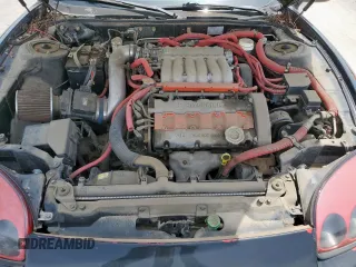 1999 Mitsubishi 3000GT z VIN JA3AM44H6XY002443, wystawiony jako Copart lot #57155505 z przebiegiem 201 588 mil mil oraz Czysty tytuł • Clean title. Historia ofert i sprzedaży dostępna na DreamBid. Obrazek 11.