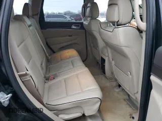 2018 Jeep Grand Cherokee Overland z VIN 1C4RJFCT7JC435403, wystawiony jako Copart lot #86568024 z przebiegiem 105 681 mil mil oraz Szkoda całkowita • Salvage title. Historia ofert i sprzedaży dostępna na DreamBid. Obrazek 10.