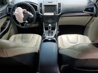 2015 Ford Edge Titanium z VIN 2FMTK3K87FBB30209, wystawiony jako Copart lot #57725425 z przebiegiem 85 562 mil mil oraz Szkoda całkowita • Salvage title. Historia ofert i sprzedaży dostępna na DreamBid. Obrazek 8.