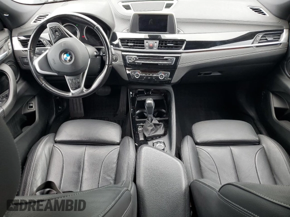 2018 BMW X2 sDrive28i with VIN WBXYJ3C34JEJ91176, listed as a Copart auction lot 63418365 with 62,586 mi miles and Salvage title. Bid and sale history available at DreamBid. Image 8.