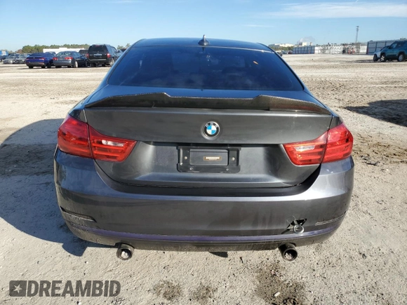2015 BMW 4 Series 435i xDrive z VIN WBA3R5C56FK371987, wystawiony jako Copart lot #88077015 z przebiegiem Nie podano mil oraz Szkoda całkowita • Salvage title. Historia ofert i sprzedaży dostępna na DreamBid. Obrazek 6.