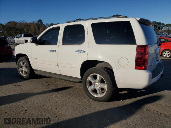 2013 Chevrolet Tahoe LS with VIN 1GNSCAE09DR340125, listed as a Copart auction lot 82894734 with 214,909 mi miles and Salvage title. Bid and sale history available at DreamBid. Image 2.