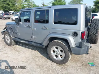2015 Jeep Wrangler Unlimited Sahara with VIN 1C4BJWEG9FL570780, listed as a IAAI auction lot 42474940 with 116,226 mi miles and . Bid and sale history available at DreamBid. Image 3.