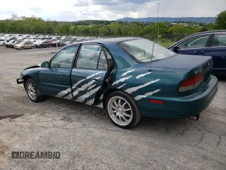 1997 Mitsubishi Galant ES z VIN 4A3AJ56G5VE019296, wystawiony jako Copart lot #56047635 z przebiegiem 87 533 mil mil oraz Szkoda całkowita • Salvage title. Historia ofert i sprzedaży dostępna na DreamBid. Obrazek 2.