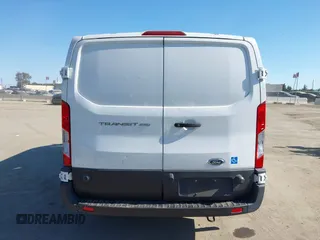 2020 Ford Transit Cargo with VIN 1FTBR1Y83LKA67103, listed as a IAAI auction lot 42408599 with 76,837 mi miles and . Bid and sale history available at DreamBid. Image 16.