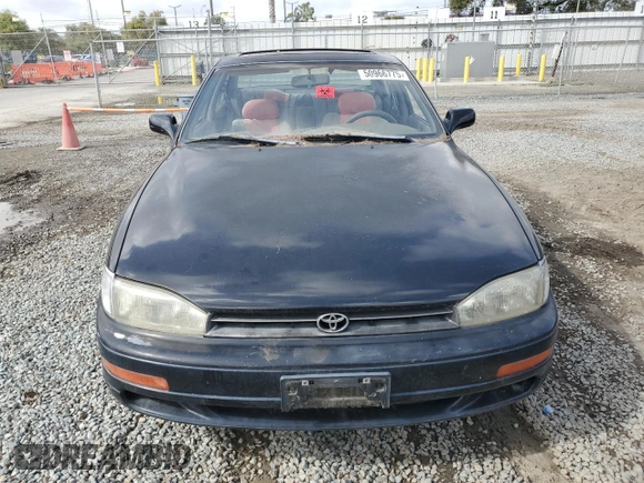 1994 Toyota Camry XLE with VIN JT2GK13E0R0012242, listed as a Copart auction lot 50966775 with 70,922 mi miles and Salvage Title. Bid and sale history available at carsss.com. Image 5.