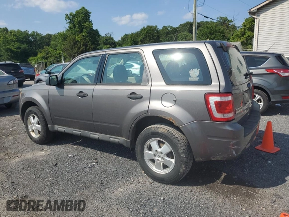 2012 Ford Escape XLS with VIN 1FMCU0C78CKA70652, listed as a Copart auction lot 60624215 with 203,220 mi miles and Clean title. Bid and sale history available at DreamBid. Image 2.