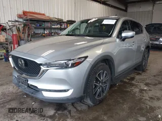 2018 Mazda CX-5 Grand Touring with VIN JM3KFBDM4J0350420, listed as a IAAI auction lot 41881566 with 96,515 mi miles. Bid and sale history available at carsss.com. Image 2.