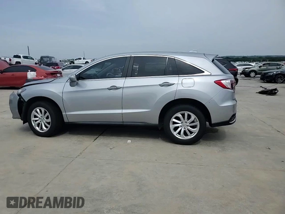 2018 Acura RDX with VIN 5J8TB3H34JL011396, listed as a Copart auction lot 56889575 with 69,300 mi miles and Salvage title. Bid and sale history available at DreamBid. Image 14.