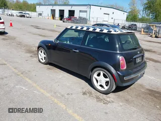 2003 MINI Hardtop with VIN WMWRC33463TC41773, listed as a IAAI auction lot 42223276 with 115,127 mi miles and . Bid and sale history available at DreamBid. Image 3.