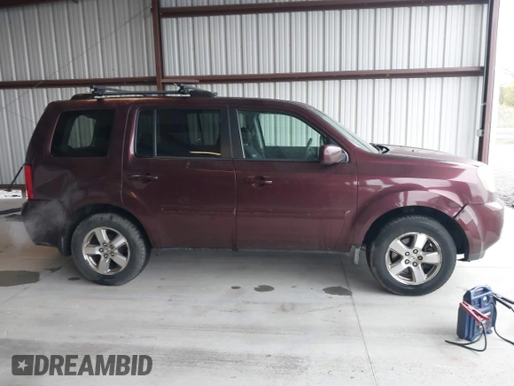 2009 Honda Pilot EX with VIN 5FNYF48499B005597, listed as a IAAI auction lot 41975121 with 309,769 mi miles. Bid and sale history available at carsss.com. Image 13.
