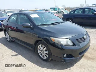 2009 Toyota Corolla with VIN 1NXBU40E29Z085117, listed as a IAAI auction lot 42059893 with 199,576 mi miles. Bid and sale history available at carsss.com. Image 1.