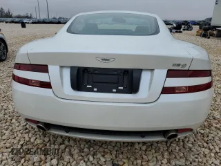 2009 Aston Martin DB9 z VIN SCFAD01E59GA10938, wystawiony jako Copart lot #39463124 z przebiegiem 19 856 mil mil oraz . Historia ofert i sprzedaży dostępna na DreamBid. Obrazek 6.
