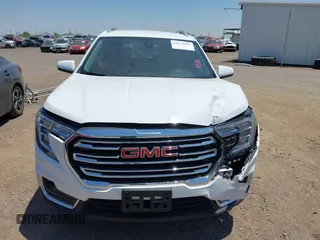 2024 GMC Terrain SLT z VIN 3GKALVEG6RL322810, wystawiony jako IAAI lot #42478282 z przebiegiem 32 523 mil mil oraz . Historia ofert i sprzedaży dostępna na DreamBid. Obrazek 12.