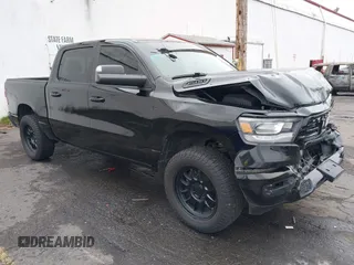 2019 Ram 1500 Big Horn/Lone Star with VIN 1C6SRFFT9KN625013, listed as a IAAI auction lot 41611276 with 100,463 mi miles. Bid and sale history available at carsss.com. Image 1.