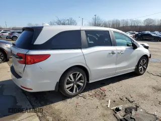 2023 Honda Odyssey Touring with VIN 5FNRL6H81PB005652, listed as a Copart auction lot 43769035 with 29,972 mi miles and Salvage Title. Bid and sale history available at DreamBid. Image 3.