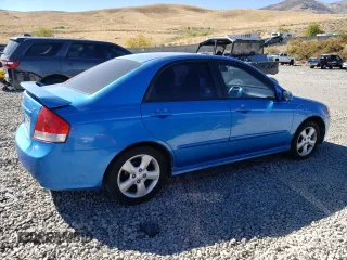 2007 Kia Spectra EX with VIN KNAFE122575008783, listed as a Copart auction lot 73116174 with 165,826 mi miles and Salvage Title. Bid and sale history available at carsss.com. Image 3.