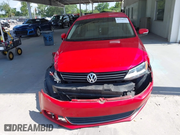 2013 Volkswagen Jetta SE with VIN 3VWDX7AJ0DM355117, listed as a IAAI auction lot 42350921 with 130,322 mi miles and . Bid and sale history available at DreamBid. Image 12.