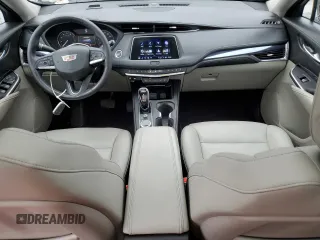 2023 Cadillac XT4 AWD Luxury with VIN 1GYFZBR42PF152462, listed as a Copart auction lot 58494825 with 35,078 mi miles and Salvage title. Bid and sale history available at DreamBid. Image 8.