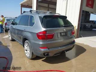 2013 BMW X5 xDrive35i with VIN 5UXZV4C59D0E08690, listed as a IAAI auction lot 41160882 with 109,182 mi miles. Bid and sale history available at carsss.com. Image 3.