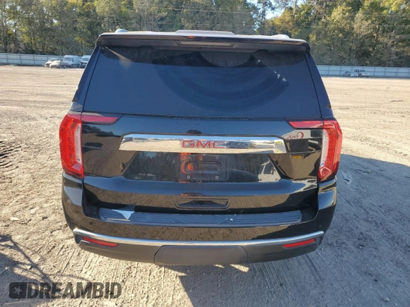 2021 GMC Yukon SLT with VIN 1GKS1BKD0MR307563, listed as a Copart auction lot 76685064 with 52,146 mi miles and Salvage Title. Bid and sale history available at carsss.com. Image 6.